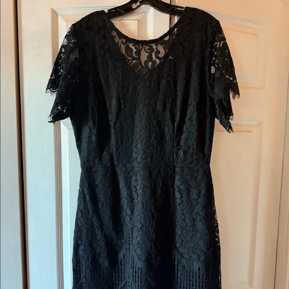 Short sleeve black lace dress. New with tags.